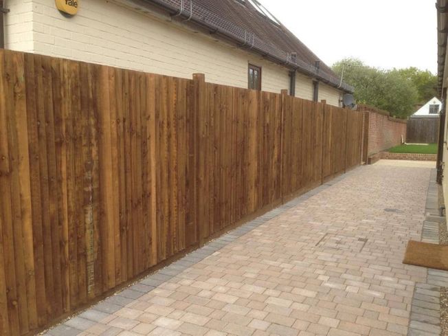Domestic fence panels installed on a customers drive