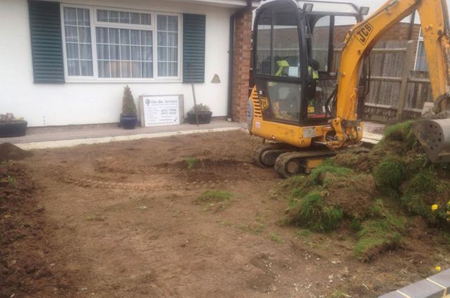 Mini digger hired to clear a customers front garden